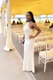 I wore this dress at a friends wedding, theme was black or white and I picked this white dress, it was so classy, chic and elegant, I turned so many heads. It looks expensive, quality is really good. It also comes with a liner inside. - Omega M.