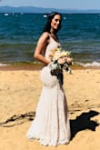 I bought this dress as my wedding dress.  Honestly it was love at first sight the moment I saw this dress I fell in love with it. It was the perfect beach wedding dress for me.  It fits true to size it's very elegant but casual at the same time. I just love it.  It was super comfortable as well.  Everyone complemented my dress this day. - Belen G.