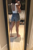 This bodysuit is super soft and adorable! It's a little flirty with the tie straps and how low it goes in the back. Thick material is great - I wore pasties and it was great coverage. This is perfect to dress with high-waisted shorts for festivals or dress up with cute jeans for outdoor BBQs. Love love love it and would highly recommend! - Amanda C.