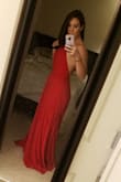 I bought this dress for engagement pictures and am so pleased! It is very flattery and flowy (but still full at the bottom). The material is also slightly stretchy so I didn't have to worry about it clingy too much and showing off cellulite! Haha. A true red color (the website pic seems a little orangish but happy to see it's a true red). - Erica R.