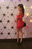 I love it!! I was worriend about the size because the others reviews says that runs small... but no!!! If fits perfectly!! The color is so bright! The material is not thin
Ans the back detail is beautiful. Mmm is a little to short but It looks super sexy - Lizia P.