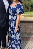 I wore this to a wedding over Labor Day Weekend and got so many compliments. It is a wrap dress and I think it would look flattering on just about anyone. When I first got it in the mail, it seemed a little bit long but ended up being the perfect length with heels. I hope I get another opportunity to wear this! - Rianna S.