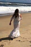 I ordered this dress as a rehearsal dinner dress for my wedding in the Outer Banks. Unfortunately, we had to evacuate due to Hurricane Florence and will be rescheduling. Before heading out, we decided to take some photos on the beach. This dress made me feel gorgeous, and definitely cheered me up during a crazy time. The flowing layers look great in the breeze! - Rachel K.