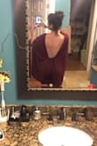 Love this dress. It's beautiful, different and sexy. Only complaint is that it rides up as you walk. But the material is great and you don't need a bra! - Rebekah L.
