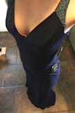 The dress fits me perfectly! I will have to wear a sticky bra with it! But that happens with every dress! I'm wearing this dress for a wedding I'm in! It is perfect! I have no complaints. I'll just wear a small heel and a bra. I would have liked the length like 2 more inches so I can wear big heels but that isn't a problem! - TAYLOR U.