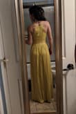 This dress fits like glove.  I was worried that the color would be a darker mustard but it is a light yellowish mustard. - Maria A.