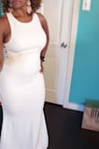 Super cute but runs small. I'm petite, athletic, & curvy. I should have gotten a medium, but it's a sexy dress. - Chiquilla