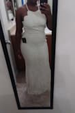 This dress fit so well! Since the straps adjust I won't need to get the top altered but I will definitely have to get the bottom hemmed. I was so excited when I tried this dress on. It really accentuates your curves. The color is cream so it is pretty dark but like others said, in pictures it looks white so it doesn't bother me. I can't wait to wear this for my courthouse wedding in April! I will only add a bridal belt for extra detail. - Precious S.