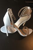 Ok, I know Iâ'm a bit of a shoe "fanatic" or collector or what ever you would like to call it; but these shoes are literally AMAZING. The fit is perfect for my foot and for the size of the heel not at all uncomfortable! 

I'm usually a block heel or wedge type of gal, simply because every stiletto heel I've ever worn has been extremely uncomfortable to wear during long hours at the office or any event that requires a lot of standing.  But the strap around the ankle that attaches to both the base of the shoe and the heel of the shoe provides SOOO much extra ankle support; allowing me to wear them long hours without feeling like my ankles are going to give out! These shoes are true to size in length, but are narrow along the arch of the foot. I have naturally narrow feet so this wasn't a problem for me but I can see where they may be uncomfortable on a wider foot.

Moral of the story; The subtle snake skin detail, the colors, the perfect fit. These heels couldn't be any better in my opinion!! 

Hands down these shoes are now a new part of my favorites. I will definitely be looking through LuLu's site to try to find similar shoes to these! - Devon D.