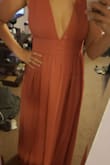 I got the dress (and shoes) in and as soon as I zipped up the dress I new I couldn't wait to see what it looked like. I put on the shoes for the full effect and fell in love! The wedding I got it for hasn't come yet, but I couldn't hold back from snapping a few pics for my husband (which I'll share with you too)!

(*the color in my pictures looks duller than it is. The color matches Lulus picture!) - Jaclyn B.