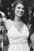 I loved this dress! I didn't have to do anything to it. I was still nursing my baby when I first got it so I was about a 32DD and it fit perfect. My the time I wore it my chest was back to my normal size of a 32D so it was a little big but it still looked cute. If I would have worn some kind of bra it would have looked better but that's my fault for not trying it on again closer to the wedding. - Kelsie A.