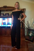 I ordered this for my 17 year old daughter to wear for the homecoming parade since the homecoming court had to dress in all black for this.  We were worried about the length and it not being long enough because she's so tall.  Let me tell you this jumpsuit fits her perfectly!!!!  The material is stretchy yet elegant looking.  I cannot say enough good things about it.  We ordered a small and even wondered before it came in if we should have gotten a medium.  The small is perfect especially with the stretchiness of the material.  She said it was super comfy too! I only wish it would fit me too! - Misty C.