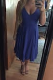 This dress was perfect. It fit great and looked amazing! I was in between a large and medium however I am very happy I went with the medium! Bonus points for it being supportive so I don't need to wear a bra. - Anna L.