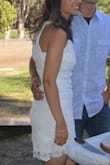 Wore this dress in a size SM and ivory/white color to my engagement bbq. Loved the fit. Since it was an outdoor bbq I decided to dress it down a bit with some rose gold sandals, but it worked really well! Would buy in other colors too =) - Ina G.