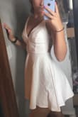 The material is soft and NOT see through!! The dress is very comfy and it fits really well! I love it!! It isn't too short or too long. Also, doesn't show too much cleavage! - Frannie H.