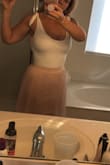 This bodysuit is so cute! I bought the white one to wear to my bridal shower. It is so soft and the size fits perfect! I wore without a bra and it was not see through. - Adrienne B.