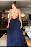 This dress is absolutely beautiful! The adjustable straps are nice and let you get the top to fit in the way that you need. The bottom part is so flowy and the back is extremely flattering (my favorite part). Normally I wouldn't go for this color, but I am so glad I did! I would 100% recommend this dress! - Jessie R.
