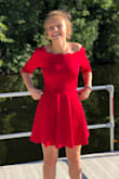 I loved this dress. The material was not itchy at all and it fit perfect. I was getting compliments all night on how great it looked. It was also stretchy so i didn't have to worry about it being too tight. It fit right to my body which was really nice. :) - Therese S.
