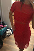 This dress is absolutely beautiful! The lace is so gorgeous and I love the color red that it comes in. I bought the XS although I could have done either an XS or S... I just really like wearing dresses tight. This fit perfectly on me. There is no stretch to the fabric. Fits true to size. I did not wear a bra with this dress (hate wearing bras and the lace detail helped camouflage the area). It hit me knee length and was appropriate for the wedding I went to which was black tie optional. - Rebecca Z.