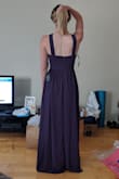 The dress is very tight in the chest, even without a bra. I'd advise anyone with a medium or larger chest to size up. Otherwise, it fits nicely. The color is absolutely gorgeous. The material wasn't what I expected (I for some reason expected it to be more of a cotton feel), but it is a very nice dress and the fit is true to size. The dress is extremely long. If I wore this, I'd definitely have to get it hemmed a few inches. - Olivia F.