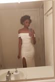I was searching for a simple but still elegant wedding dress for my private, simple wedding in January of 2019. I ran across this dress and was hesitant because I have slight curves but am small and I'm quite tall so nothing usually fits right. 
I was blown away by this dress! It's form fitting and flattering and it goes all the way down to my feet! It's sexy but still appropriate for the wedding! I love it! - Erin B.