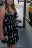 This dress is very loose on the body and flowy. I was about 150-160 lbs in these photos and weigh 135 lbs now and the dress looks just as cute, but even better. This dress is great because i gained and lost a lot of weight, but could always wear this dress! - Brooke M.