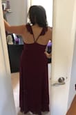I bought this dress to wear to my friend's fall wedding and it was perfect! I typically buy one size up than normal to be safe. I did need to have it hemmed, but otherwise it fit great. The fact that it's a wrap dress allows you to make it a little tighter and the adjustable straps allow for your bust to fit as needed. I got so many compliments on this dress and I felt comfortable the whole night. - Sunny L.