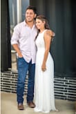 I would normally wear a XS but other reviews said to size up... I got a Small and it fit perfect ! It was long but not enough to get it fixed ! The material had about 3 layers so it wasn't see through and the top part had a nice floral design. The dress was used for my 5 year Vow Renewal and it was so beautiful. I have had SO many compliments...! This dress was just enough but not over the top fancy. It made me feel beautiful. I would recommend this to anyone from Prom to Weddings! Love it! - Samantha M.