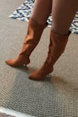 These are perfect for petite girls like me. They hit right at my knees. I would recommend at least going up a 1/2 size as they fit a bit snug due to the pointed toe design of the boots. Great fall color. Thank you Lulus for keeping short girls in mind. Keep the boots coming!! - Vernessa C.