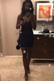 It fit like a glove. The color is a perfect navy blue. Great quality. It was thin in a good way with a little stretch. Very comfortable. Short but didn't ride up. Very classy. Perfect little blue dress! - Makayla C.