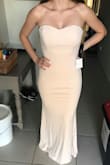As I'm from Australia I was at first a little bit disappointed over the price of the dress (it doubled in price for AU which I didn't realize as during checkout it didn't specify that it was USD...) However, the dress it stunning. It runs a little large around my waist and gathers a little bit when I sit down, but because of the fit it is very comfortable.
Very elegant, very classy and I'm excited to wear it to the actual event. - Mikayla P.