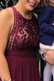 My gut was to go with a L but there weren't any in stock. Despite the medium being pretty snug, it worked and I had lots of compliments!!! The neckline is beautiful! - Breann W.