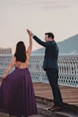 Bought this dress for my engagement photos. Loved the color. The dress is so flowy & fun. Very well made. Runs large. I'm 5'9 & even with heels I was stepping on the hem. - Amber S.