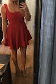 This dress is very flattering! Hugs in all the right places. I am large chested and no bra required. Great for summer but I'm excited to pair it with tall boots and stockings. It's short, flirty, and fun! Nice material! - Lauren T.