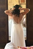This dress was all I could have ever dreamed for in a wedding dress. I was reluctant to spend a ton of money on a wedding dress and knew if I went into a bridal shop I'd be emotionally conned into buyers remorse. When I saw this dress, I knew it was the one! On my wedding day everyone was giving me compliments and in absolute disbelief that I bought it online for such an affordable price! It felt and looks so romantic on and flows so beautifully when you walk and dance which is ideal for photos! Since I'm posting one professional photo, I need to disclose my photographer is EmaReide photography in San Antonio. - Brittany A.