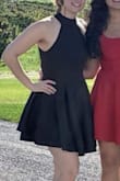 I bought this dress for a wedding this past weekend. The material is very nice. The only thing I had concerns with was how short it seemed. I made sure to wear some boy-shorts just in case my dance moves became a little too risque. Lol I did have my seamstress move the buttons on the neck in a little more. Otherwise, the dress was great and I received a lot of compliments! - Brittany W.
