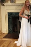 Loved the dress!! Beading was beautiful and was well made with high end material. Top was a little loose but added in another set of cups and fit perfectly. Wore it on my wedding day. - Lauren B.