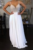 I ordered this dress to wear during my wedding reception since the dress I picked for my wedding is heavy and a little uncomfortable (to be honest).. Having paid 2k for wedding dress I had pretty low expectations of how a 250 USD wedding dress would look and feel... I could not believe the amazing quality of this dress when I opened the package, it's totally comparable to dresses I tried at bridal shops for 1.2k 1.5k. The beading of the top of the dress is so well done and detailed, it reminds me of a Morilee dress I tried when I was searching for dresses... The layers of the bottom are super delicate and the dress falls perfectly. I Love the material and the detail of the see-through top. The color is perfect (Ivory / off-White). I ordered a size 2 and it fit me perfectly, I will only have to get the hem fixed since I'm only 5'3". I wish I would have ordered this dress before buying the dress I will wear during my ceremony... after trying this dress I realize it was so perfect that I could have wore it for my ceremony as well...You really feel like you are wearing a high quality, well done dress from a high end designer. I freaking love this dress!!!! Thanks Lulus. - Thaly L.