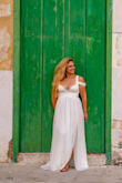 The quality of the dress is amazing! It definitely looks exactly like it does in the picture! I took my engagement photos in Cuba! I got a lot of compliments! People thought I had just gotten married! - Astrid R.
