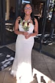 I wore this for my courthouse wedding and Got so many compliments! I added a rhinestone bridal belt and it was perfect! It's pretty long, but when I put on my heels it didn't drag or anything. Loved it! - Diamond H.