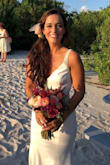 This dress is absolutely gorgeous. I ordered it as a backup for my Florida wedding in October and ended up loving this dress more than any of the others that I tried on. It is flattering, intricately beaded, and beautifully made. It hugged my curves in all of the right places and made me feel like such a beautiful bride. If you are looking for a dress for your beach wedding or any other event, I highly recommend this dress. There was a small train in the back, which was perfect -- no alterations needed! - Luci C.