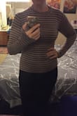 I ordered a large because I don't like my clothes skin tight and so I ordered a large and still too tight for my comfort. The length of the sleeves is way to long on me, covers my fingers, guessing because it's a large. It's a cute shirt though, so I'll keep it. - Amelia T.