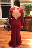 I ordered this to wear to my boyfriends military ball! I absolutely love it! It fits a little snug but the cut is beautiful and the fabric is great quality especially for the price! I will have to have it hemmed as I'm rather short and it's long. - Carson S.
