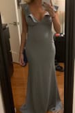I ordered this as a bridesmaids dress and the fit is Sexy and clings to all the right places. The material is thick and expensive. It needs to be hemmed but otherwise amazing. - Jona C.
