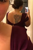 I wanted this dress to fit so badly. It made me feel like a princess. The wine color is gorgeous, and the fabric feels wonderful on your skin. The style is lovely, and it looks incredible in pictures.
That said, it doesn't actually fit, and there are no sizes above XL for me to move to. The empire waist is very, very high, and on my curves, it made it so that my cleavage was not where it was supposed to be, but instead being crushed by the full top part of this dress the bust part, as well as the waist detailing. It wouldn't zipper to the top, although it came close. I tried to convince myself I could wear it anyway, but it hurt my bust after 15 minutes, so I couldn't last a wedding. It's just not a dress designed for large bra sizes if you're also an XL and can't go up a size. It's designed for flatter chests, judging by the tightness of the top area.
I really tried to convince myself that I could make this dress work, through a tailor or something else, but in the end it comes down to the fact that the zipper and waist are so tight that there isn't any room for my bust, and so it would be too uncomfortable to wear for an extended period of time. I recommend shoppers go up a size. If you're an XL with an hourglass and a large bust, maybe you're out of luck. - Leah V.