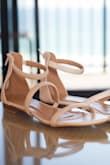 I chose these flats to wear for my wedding reception. I went barefoot for the ceremony, and these were perfect for the beach side deck. They were comfortable and stylish. I love the zipper-back portion of the flats. It makes them look fancier than a sandal. I am typically between an 8-9 in shoes and 8.5 fit perfectly. The price was very reasonable! - Christina B.