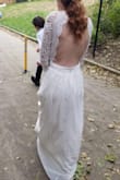 This was my SUPER last minute wedding dress. I ordered it four days before my wedding, and thank the lord it showed up on time! It exceeded all my expectations, and the pictures do it no justice. It fits true to size, I have very skinny noodle arms so that's the only part I would've liked tighter. But I seriously cannot complain. Thanks, Lulus!! - Nikki T.