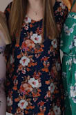 I love the dress sleeves. I got so many compliments on it. Perfect colors in floral pattern. Great dress to have in your closet. - Paxton H.