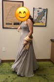 It's a beautiful gown worn for a wedding as MOH. Received multiple compliments, even the "I hope you get to wear that again". The slit is not too high (the advertised photo, the model holds it up higher than it actually is). Very comfortable dress. The top portion fit well - snug but not too tight and had some give to it. Only needed to be hemmed just a little, I wore 3 in heels with it. Also needed to be steamed, as it arrived wrinkled. True to the light grey color. - Renee P.