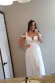 Love it! I wore it for my wedding. Love it. It fits really well but I needed to fix the shoulder straps because I'm not tall enough for the dress. - Laiza H.